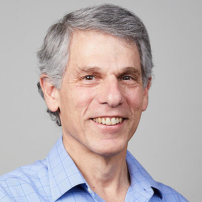 lloyd goldwasser smiling at camera
